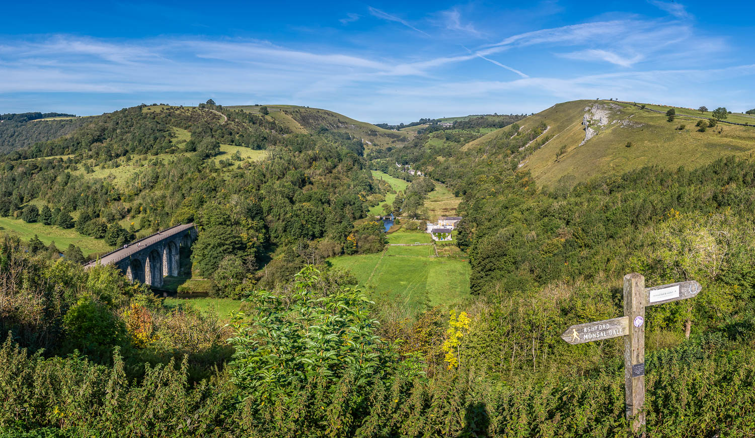 View of Monsal Dale and the Headstone Viaduct from Monsal Head - one of the great places to cycle or walk in the Peak District with kids
